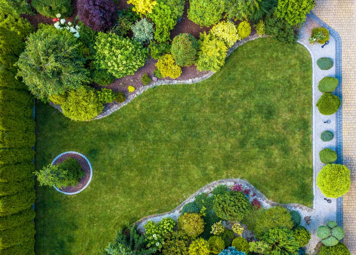 Aerial view of a beautiful residential mature garden designed by Lee's Landscaping